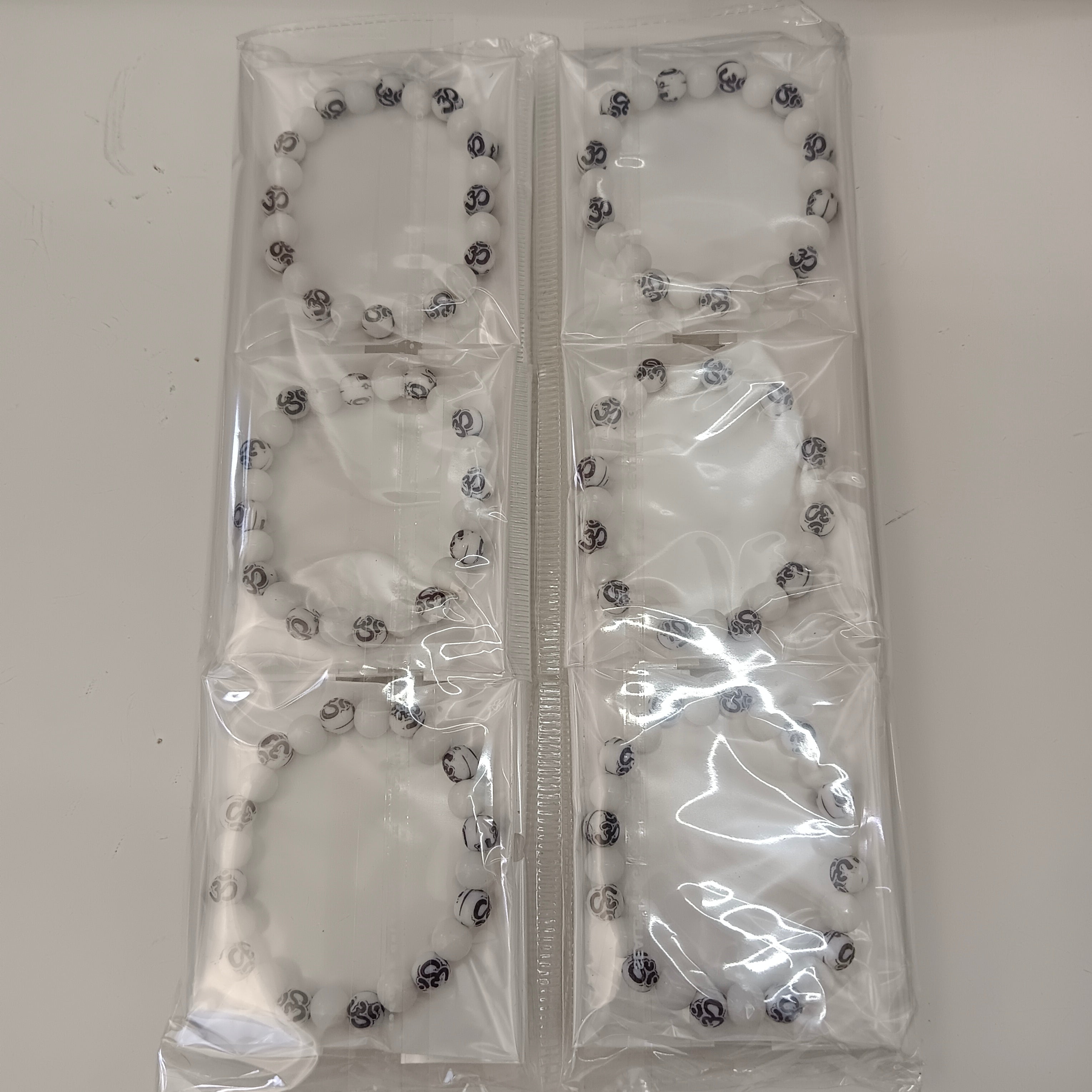 Urthn Om Beads Bracelet (Set Of 12)