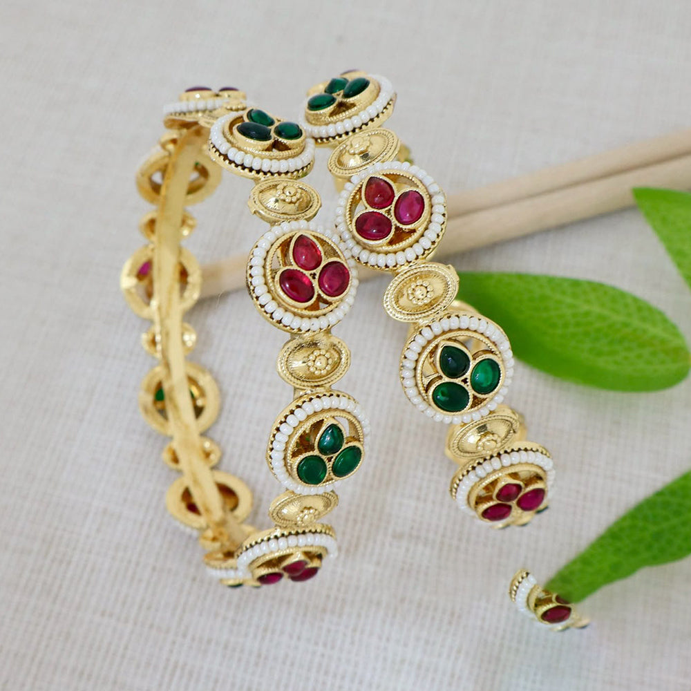 Pooja Bangles Premium Pota Stone And Pearl Embellished Bangles Set