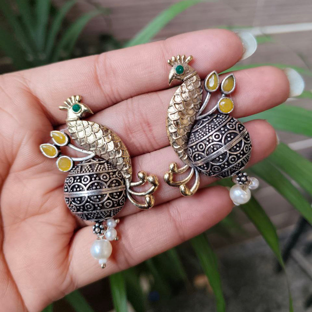 Maharani Jewels Inspired Oxidised Plated Pota And Pearl Detailing Peacock Dangler Earrings