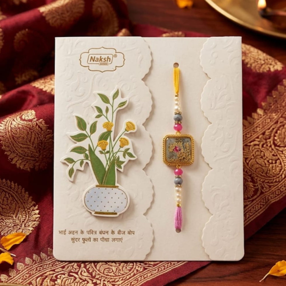 Dhirish International Thread Rakhi for a Memorable and Spiritually Rich Celebration