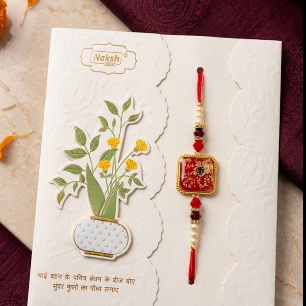 Dhirish International Thread Rakhi for a Memorable and Spiritually Rich Celebration