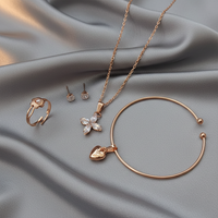 Urthn Rose Gold Plated Chain Pendant Earrings Rings And Bracelet Jewellery Combo Set (Pack Of 6)