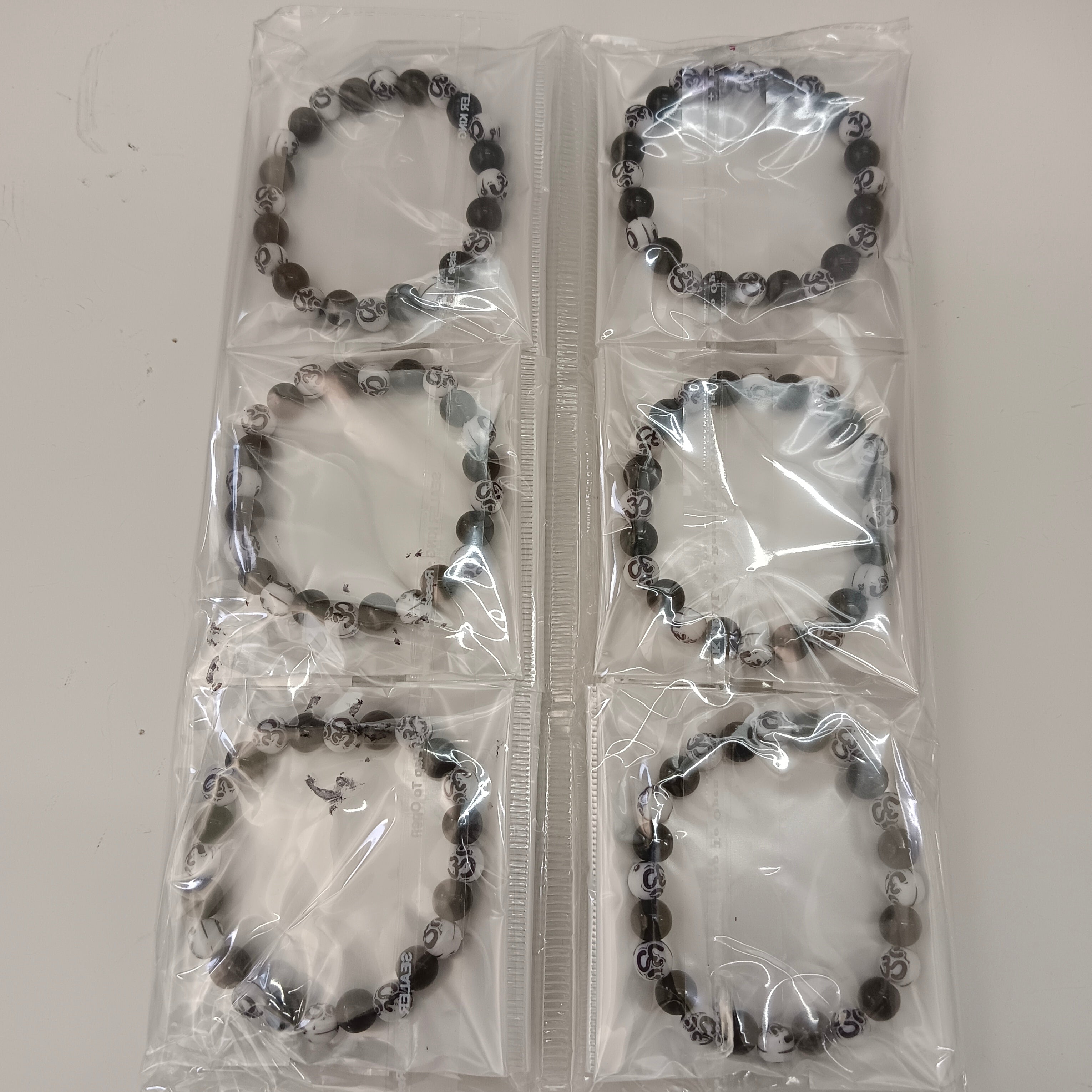 Urthn Om Beads Bracelet  (Set Of 12)