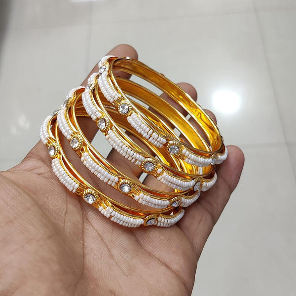 Pooja Bangles Gold Plated Austrian Stone And Pearl Bangles Set