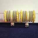 Pooja Bangles Gold Plated Austrian Stone And Pearls Velvet Bangles Set