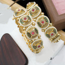 Pooja Bangles Gold Plated Pota Stone And Meenakari Openable Bangles Set