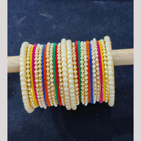 Pooja Bangles Gold Plated Pearl Velvet And Matel Bangles Set
