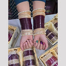 Pooja Bangles Gold Plated Austrian And Pearl Acrylic Bangles Set 