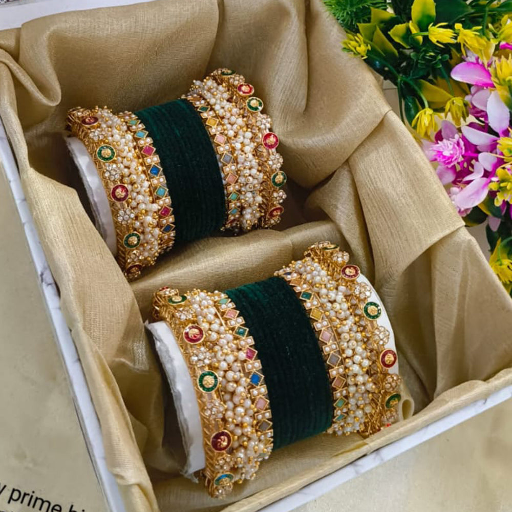 Pooja Bangles Pota Stone And Pearl Luxury in Every Layer Velvet Bangle Set