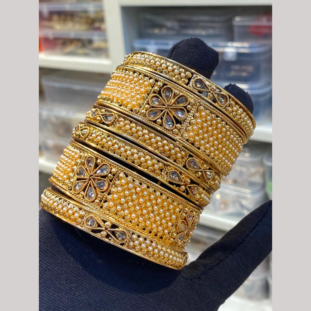 Hira Collections Premium Crystal Stone And Pearl Bangles Set