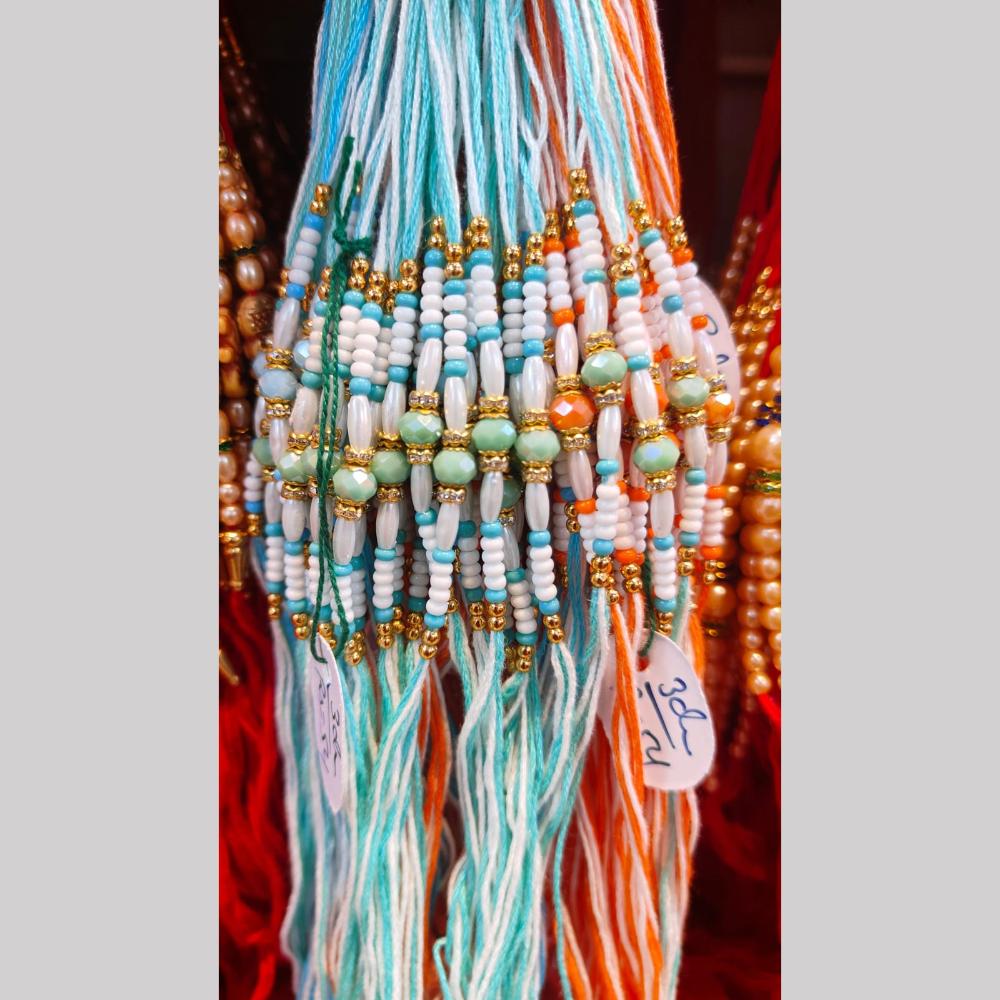Kavita Art Pack of 12 Traditional Rakhi with Elegant Pearl Accents
