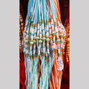 Kavita Art Pack of 12 Traditional Rakhi with Elegant Pearl Accents