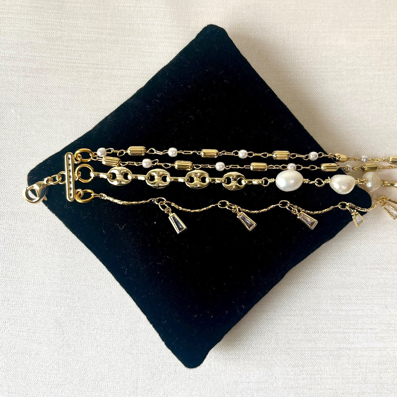 Jewel Treatzz Adorable Everyday Wear 3 Line Gold Plated Pearl Link Chain With Dangling Baguettes Fashion Bracelet