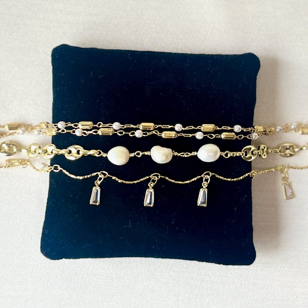 Jewel Treatzz Adorable Everyday Wear 3 Line Gold Plated Pearl Link Chain With Dangling Baguettes Fashion Bracelet