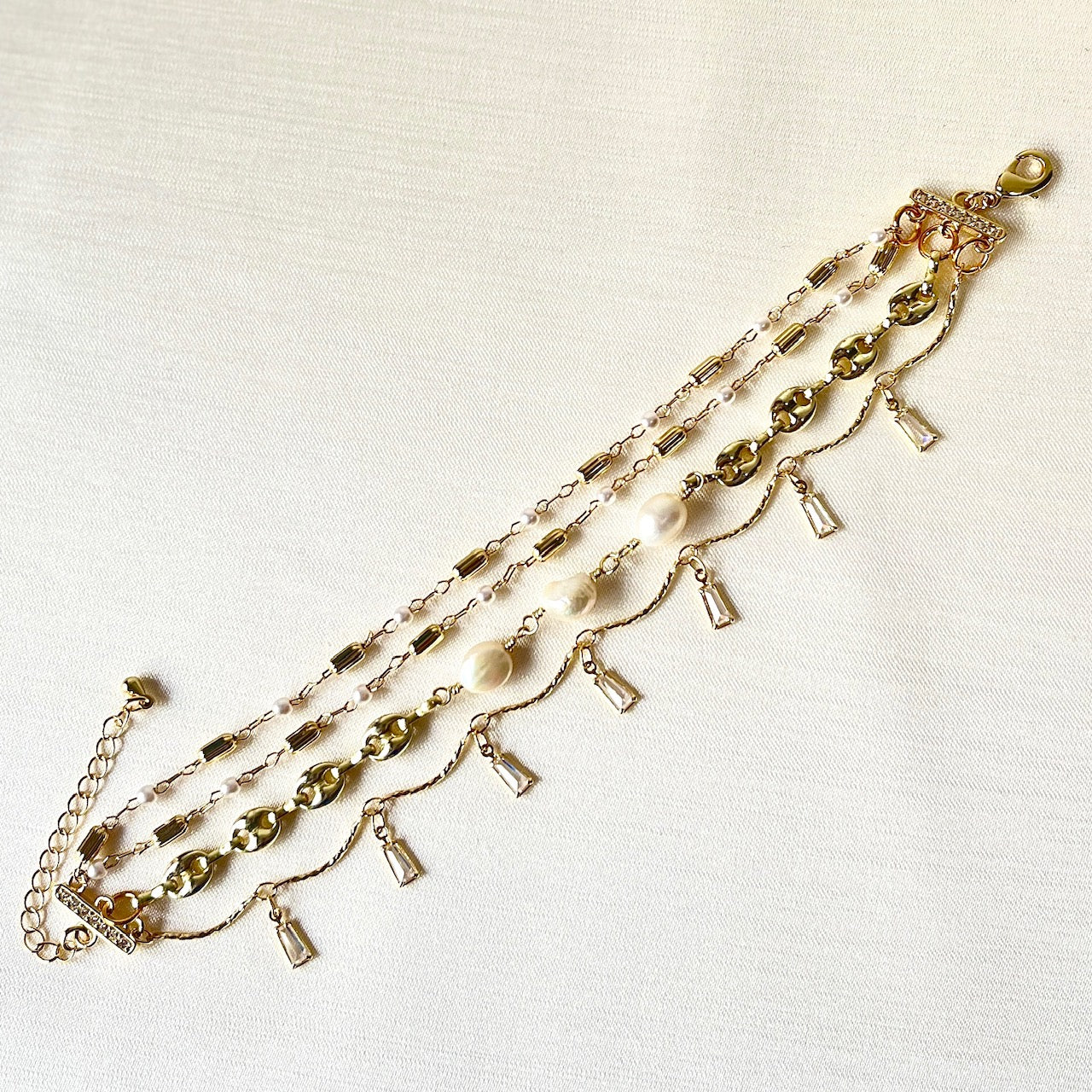 Jewel Treatzz Adorable Everyday Wear 3 Line Gold Plated Pearl Link Chain With Dangling Baguettes Fashion Bracelet
