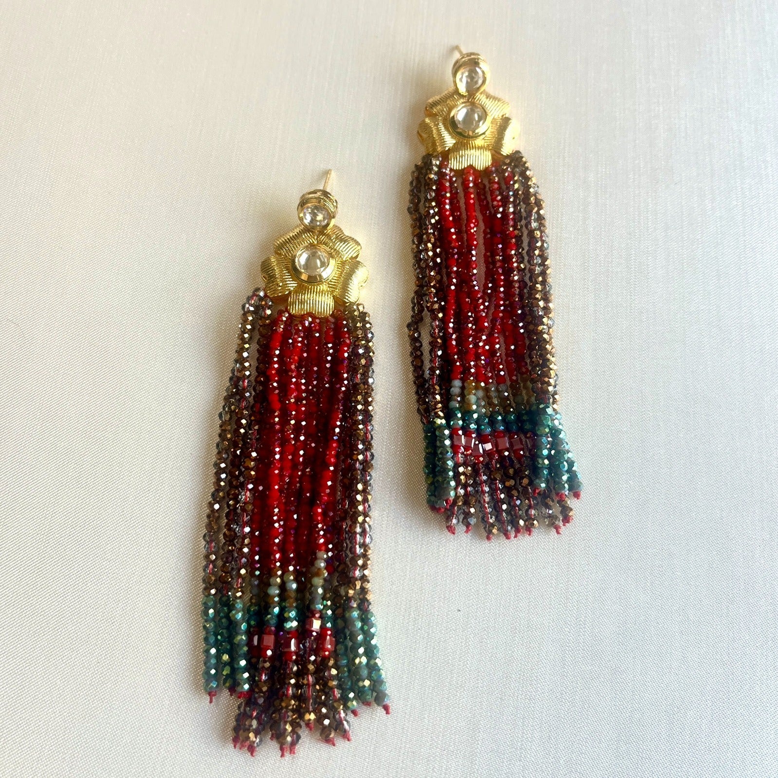 Jewel Treatzz Gold Plated Long Hand enameled Tassel Earrings Eith Kundan & Green Agate Crystals