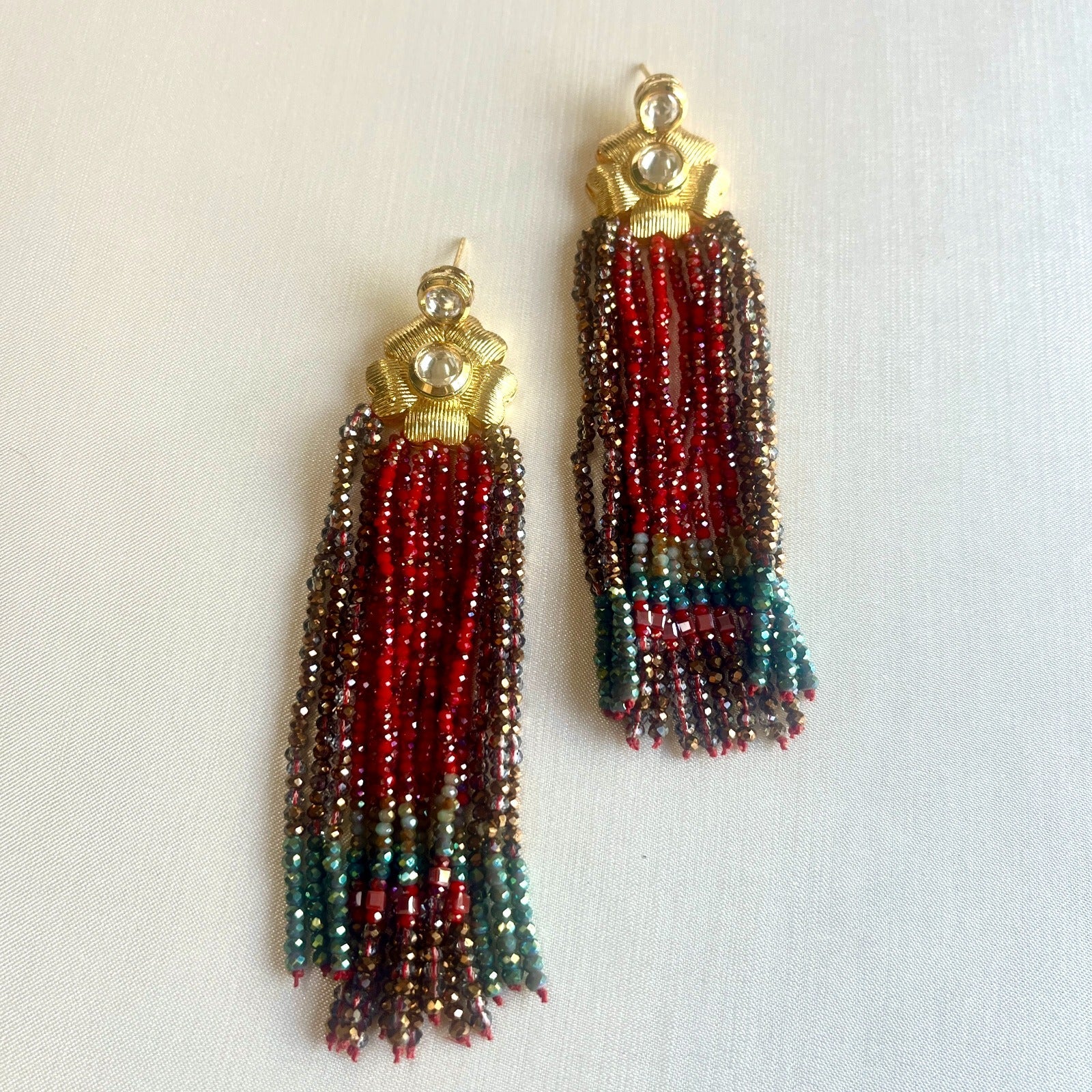 Jewel Treatzz Gold Plated Long Hand enameled Tassel Earrings Eith Kundan & Green Agate Crystals