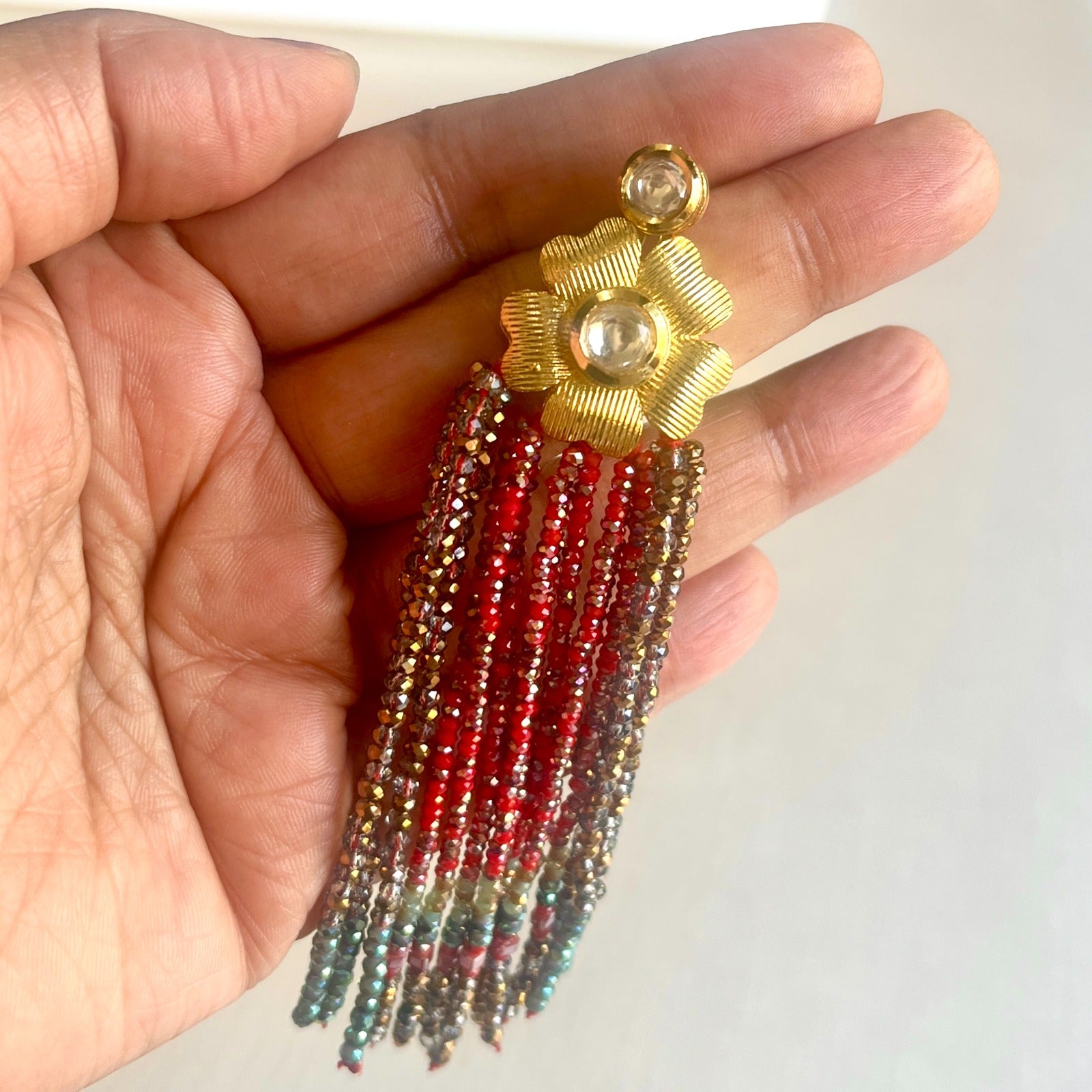 Jewel Treatzz Gold Plated Long Hand enameled Tassel Earrings Eith Kundan & Green Agate Crystals
