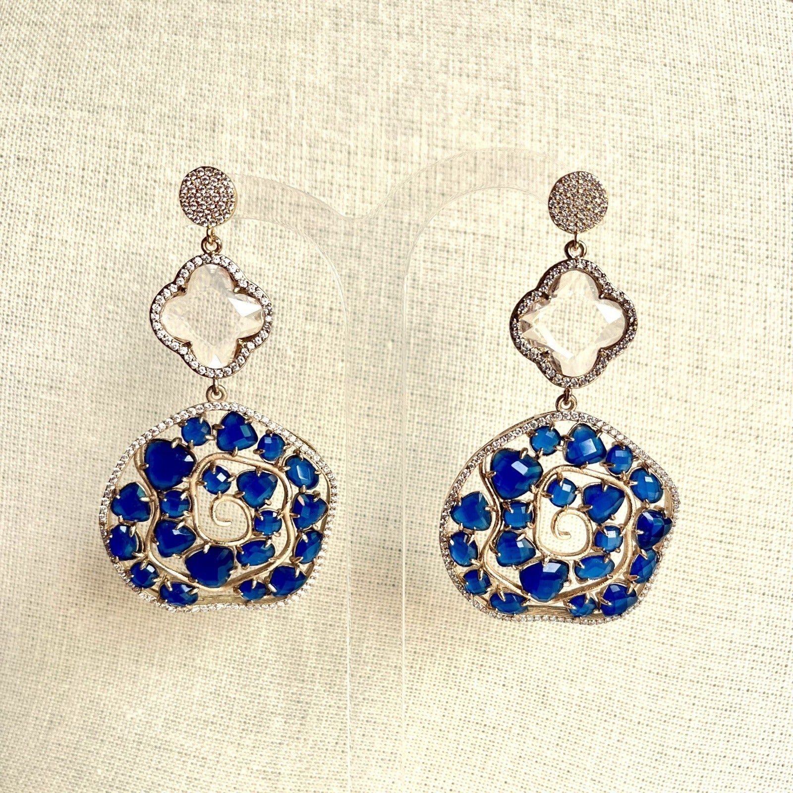 Jewel Treatzz Irregular Shaped Blue Doublet Stone, Transparent Four Petal Clover Flower And CZ Stone  Gold Plated Chandlelier Earrings
