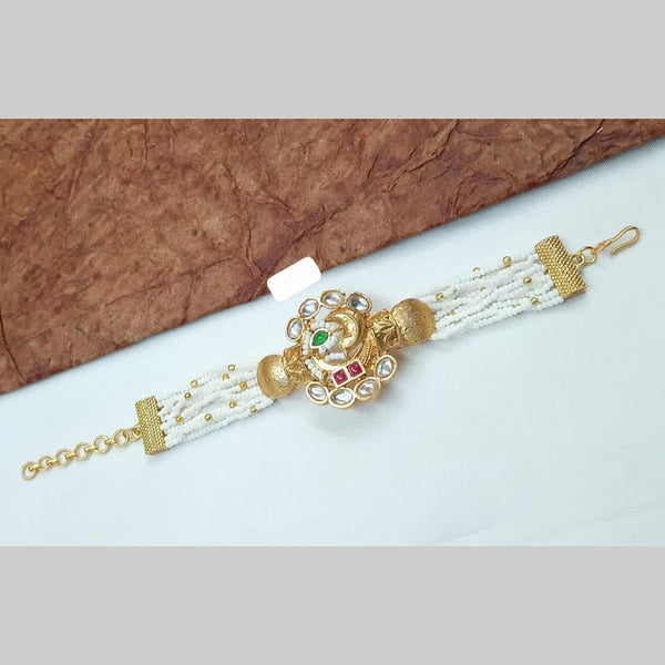 Abhinandan Gold Plated Kundan Stone And Pearls Adjustable Bracelet