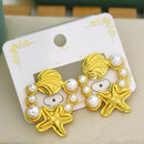 Klitz Designer Star And Shell Studs Earrings  (Pack of 12)
