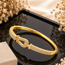 Klitz Pack Of 12 Gold Plated Loop Design Openable Kada