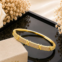 Klitz Pack Of 12 Gold Plated Austrian Stone Openable Kada