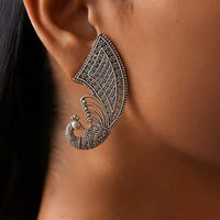 Dhirish International Oxidised Peacock Inspired Hanging Earrings