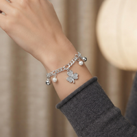 Urthn Fashionable Silver Plated With Clover Shape Charm Bracelet with Pearl Drops(Pack Of 6)