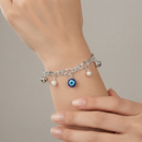 Urthn Fashionable Silver Plated With Evil Eye Shape Charm Bracelet with Pearl Drops(Pack Of 6)