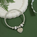 Etnico Silver Plated Charm Design Bracelet with Crystals for Women