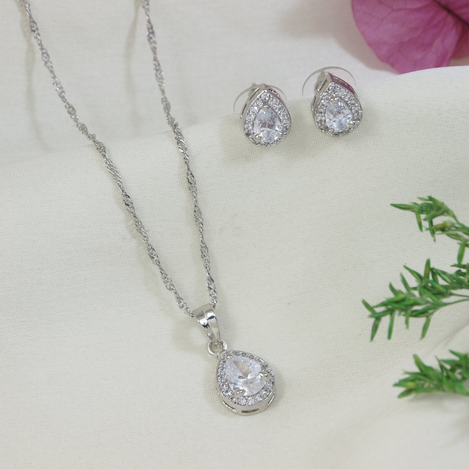 Etnico Latest Stylish Silver Plated CZ American Diamond Teardrop Pendant Set For Women