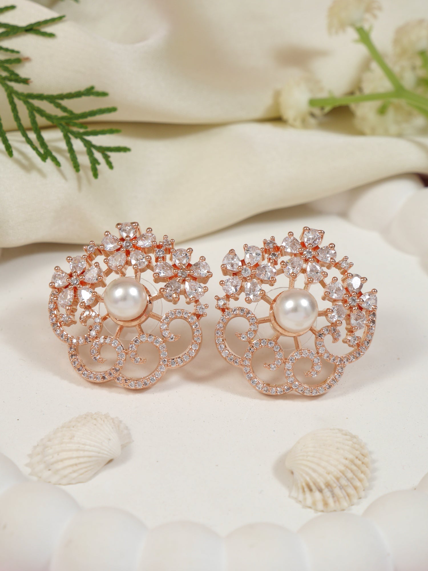 Etnico Rose Gold Plated Cubic Zirconia and American Diamond Fashionable Pearl Look Stud Earrings For Women