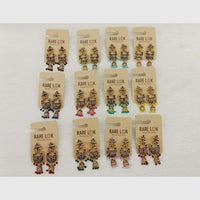 Dhwani Trendy Pota Stone And Pearl Jhumki Earrings  (Pack of 12)