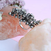 Etnico Silver Oxidised Adjustable Finger Ring Embellished With Ghungroo For Women (FL221OX)
