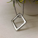 Etnico Silver?Tone Square Pendant Necklace with Minimalist Design (MJN005S)