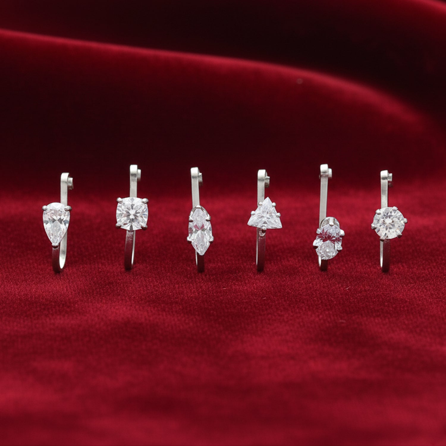 Etnico Silver Plated Cubic Zirconia American Diamond Clip On Non Piercing Pressing Type Nose Pin/Stud Combo Pack For Women (NL193S-CO)