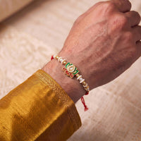 Js Fashion Pack of 3 Traditional Lotus Motif Rakhi with Elegant Pearl Bead Accents