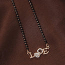 Etnico 18k Rose Gold Plated Traditional Single Line American Diamond Lovers Design Pendant with Black Beads Chain Mangalsutra for Women (D090)