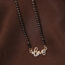 Etnico 18k Rose Gold Plated Traditional Single Line American Diamond Lovers Design Pendant with Black Beads Chain Mangalsutra for Women (D092)