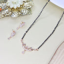 Etnico 18k Rose Gold Plated Traditional Single Line American Diamond Pendant with Black Bead Chain Mangalsutra for Women (D101)
