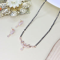 Etnico 18k Rose Gold Plated Traditional Single Line American Diamond Pendant with Black Bead Chain Mangalsutra for Women (D101)