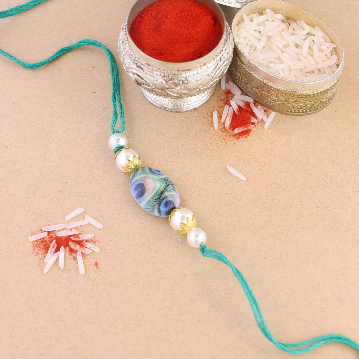 Etnico I Jewels Pearl & Peacock Feather Designer Bhaiya Rakhi With Roli Chawal for Brother/Bro/Men with Rakshabandhan Card ((R103)
